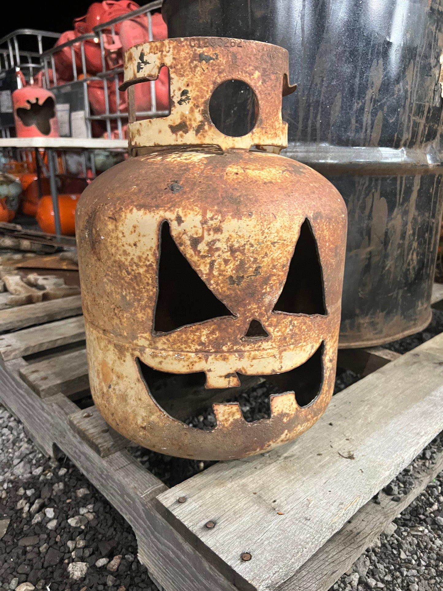 Hand cut 20 lb grill size propane Jack-o-lantern