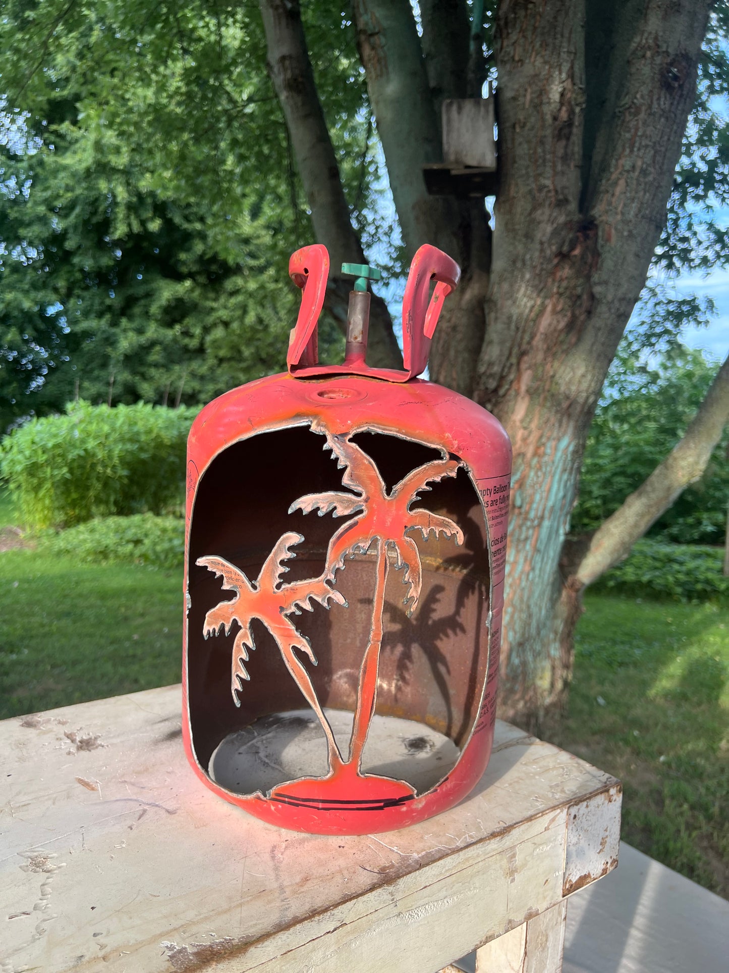 Hand cut porch lantern palm tree