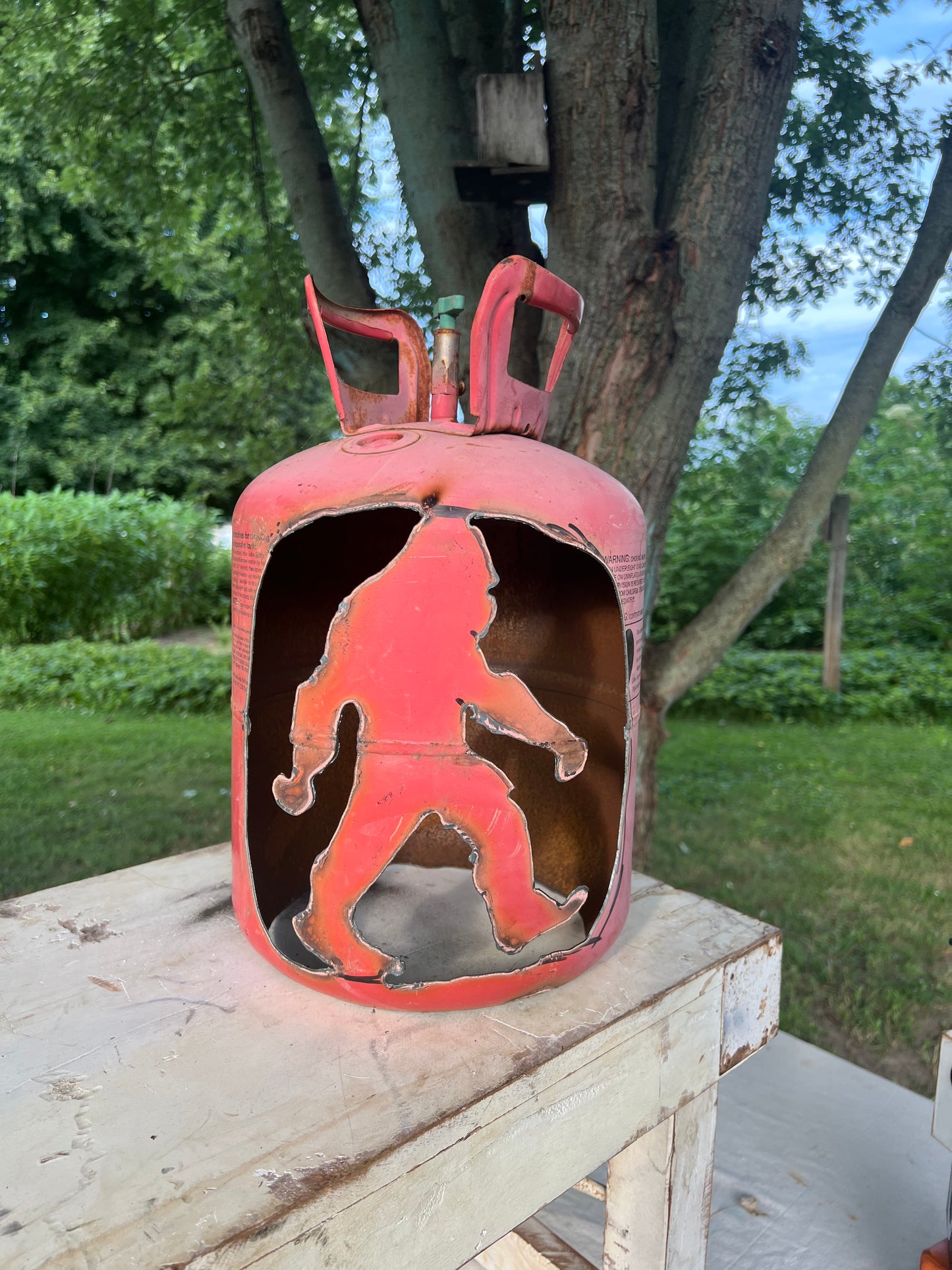Hand cut porch lantern fist  big foot